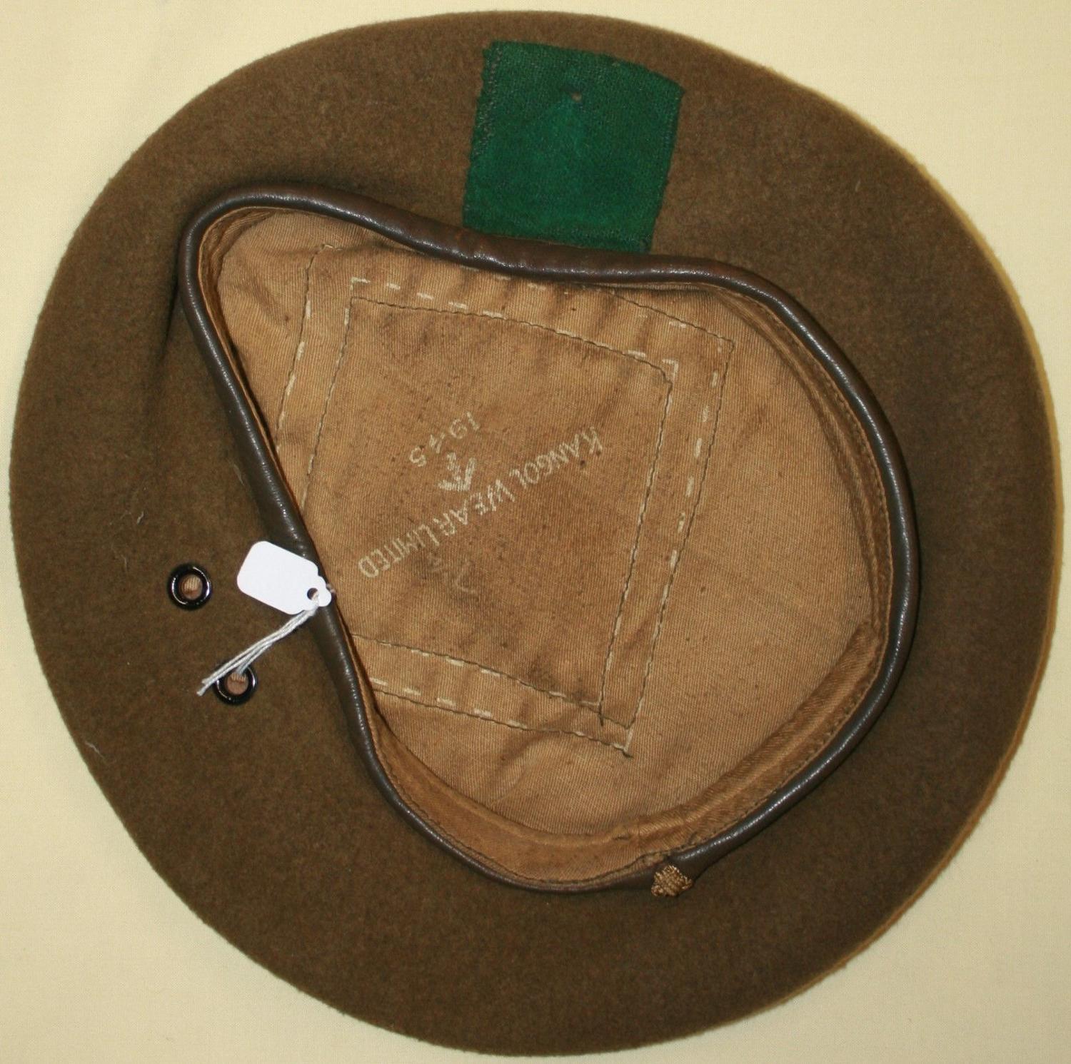 A 1945 DATED GREEN / BROWN BERET