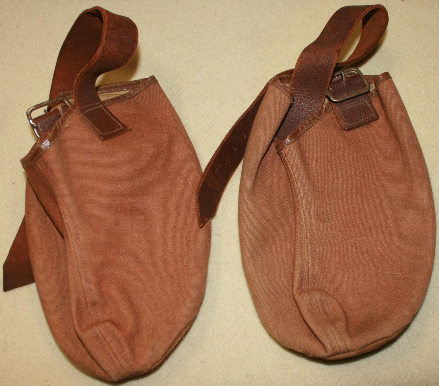 A PAIR OF 1941 DATED BOOT ANTI SLIP COVERS
