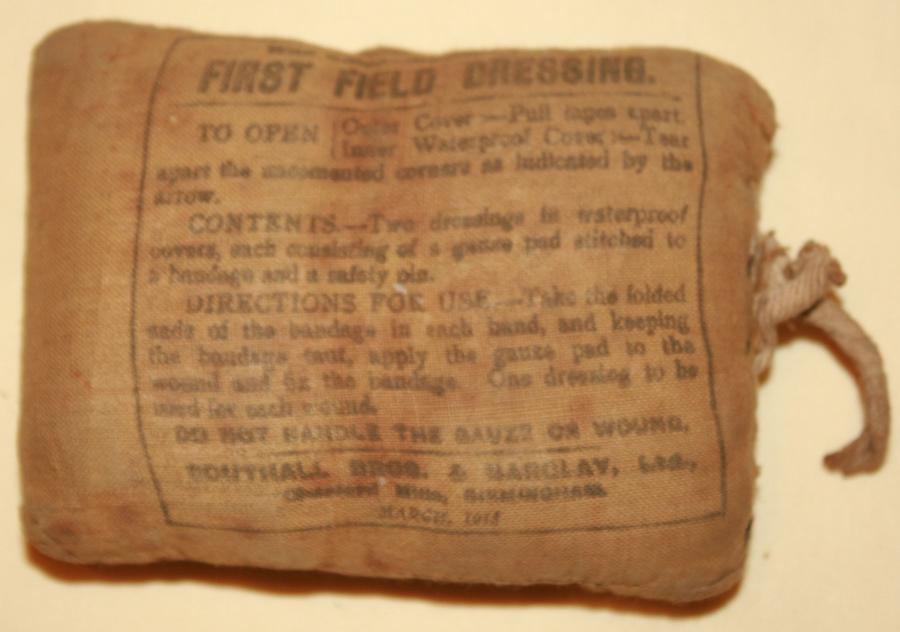 A WWI 1ST FIELD DRESSING 1918 DATED