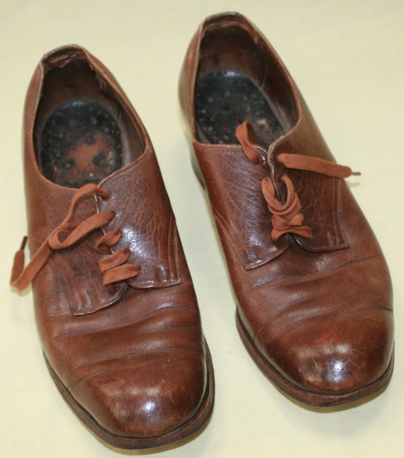 A PAIR OF ATS 1944 DATED SHOES