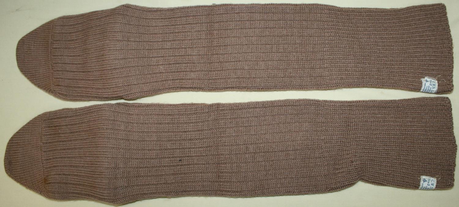 A PAIR OF WOMEN'S LAND ARMY 1944 DATED SOCKS