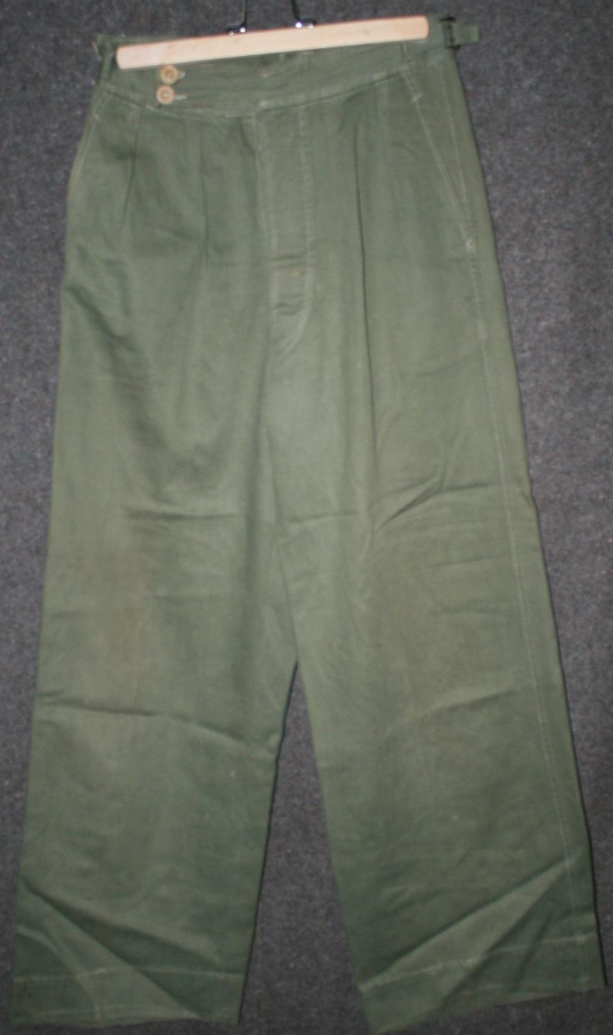 A WWII PATTERN PAIR OF JUNGLE GREEN TROUSERS
