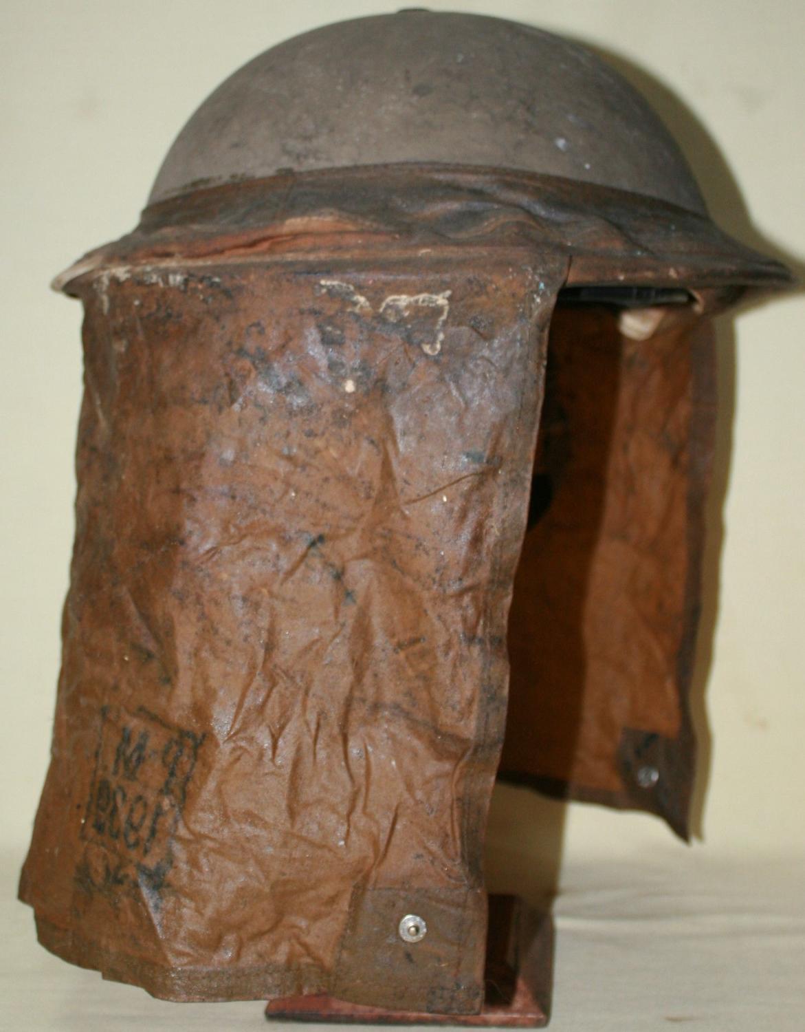 A GOOD SCARCE EXAMPLE OF THE EARLY WWII BEF GAS HOOD AND HELMET