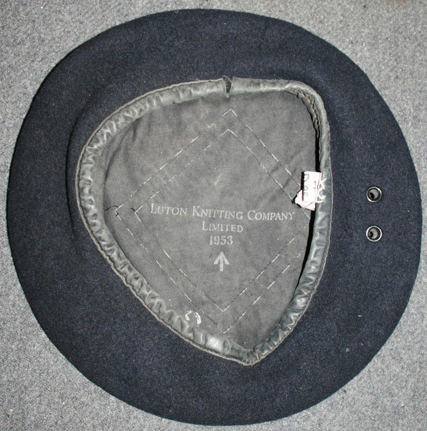 A 1954 DATED BERET