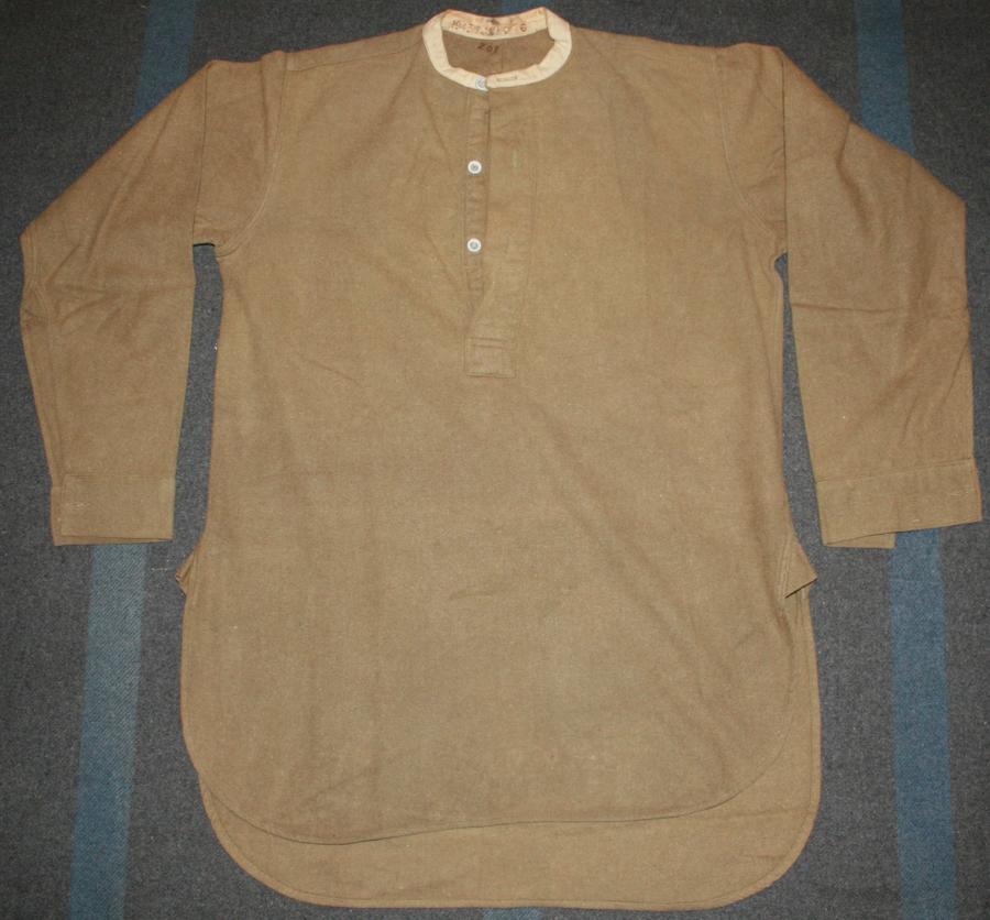 A GOOD LARGE SIZE 1943 DATED COLLARLESS SHIRT SIZE 6