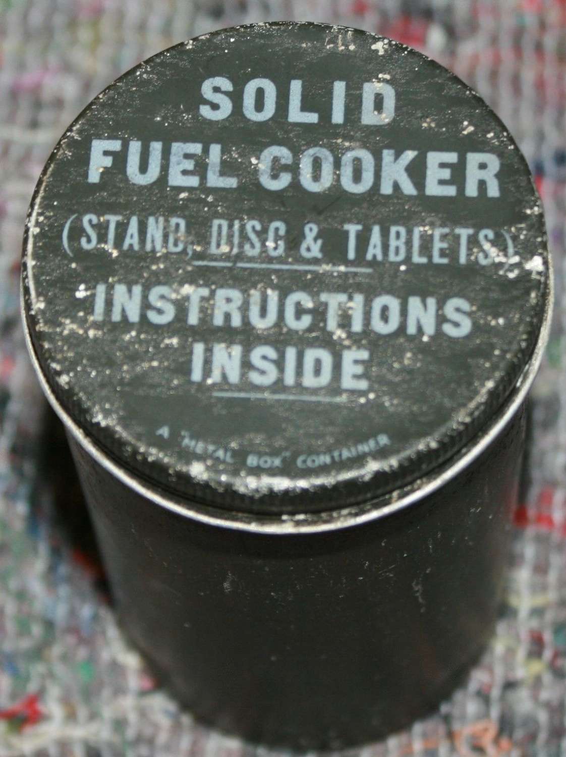 A SOLID FUEL COOKER TIN