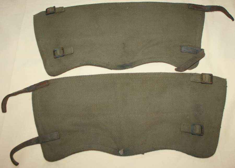 A GOOD USED PAIR OF GATTERS SIZE 3 1942 DATED