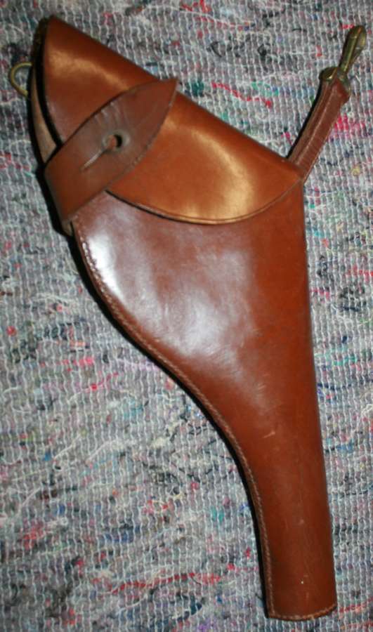 A SAM BROWN LEATHER PISTOL HOLSTER