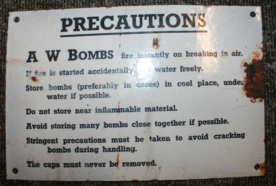 A WWII AW BOMB SIGN