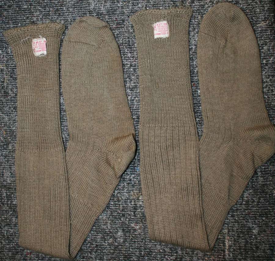 A PAIR OF KNEE LENGTH ARMY SOCK 1945 DATED