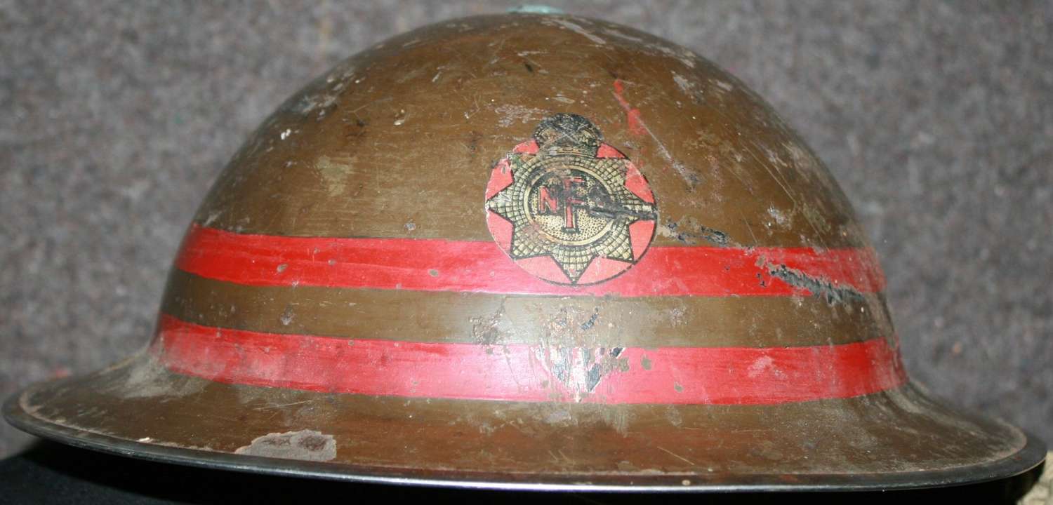 A WWII 2 RED BANDED NFS FACTORY STEEL HELMET