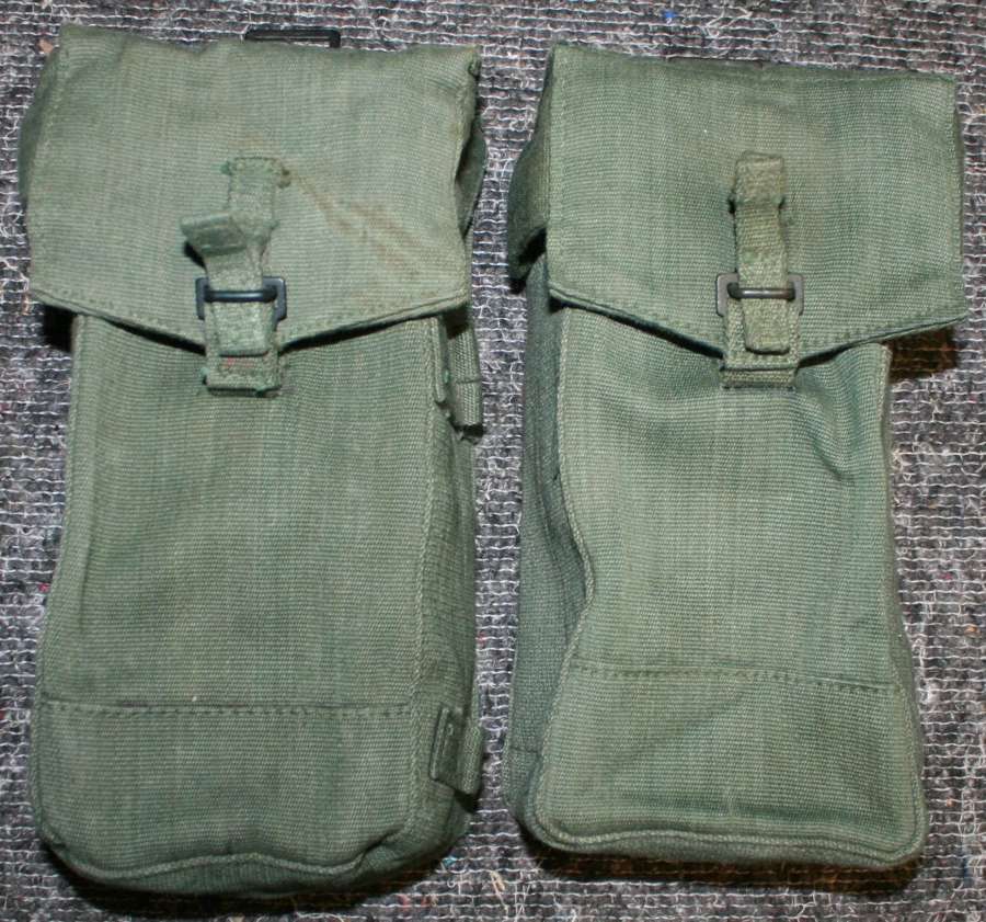 A PAIR OF 44 PATTERN 1945 DATED AMMO POUCHES