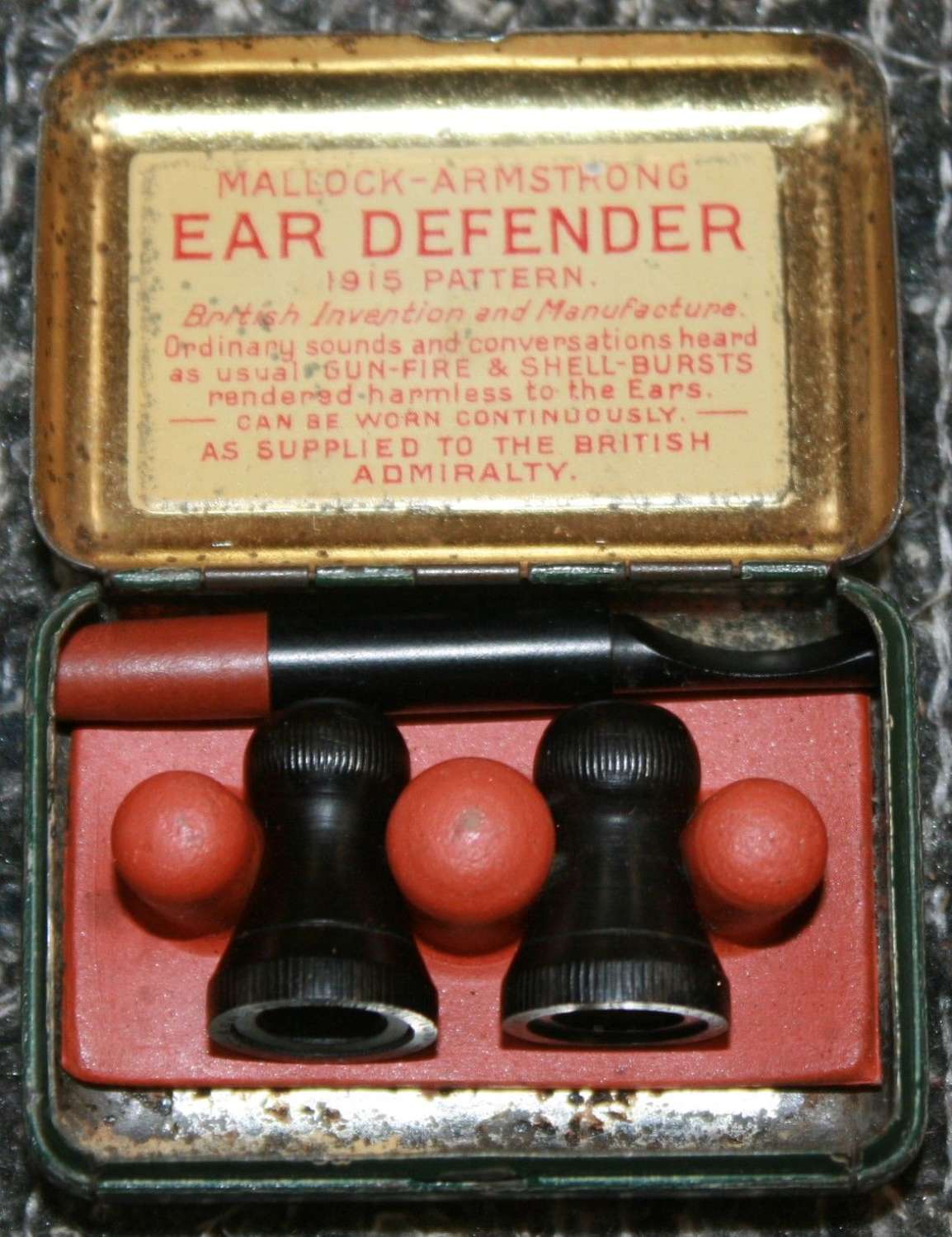 A CASED PAIR OF WWI PERIOD MALLOCK-ARMSTRONG EAR DEFENDERS