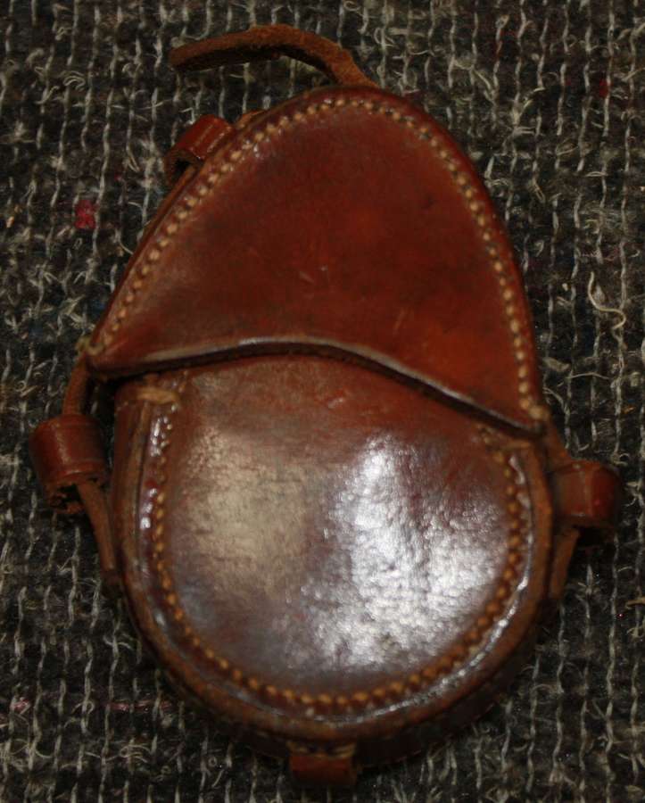 A 1917 DATED LEATHER COMPASS POUCH