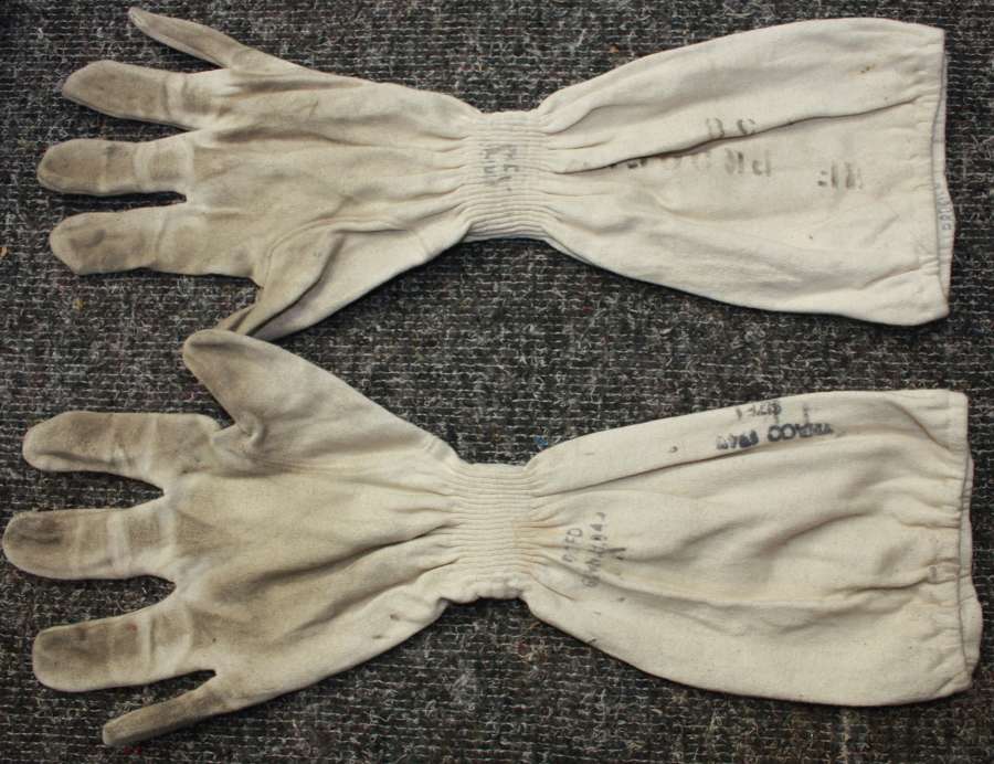 A 1945 DATED RN FLASH GLOVES AND HEAD COVER