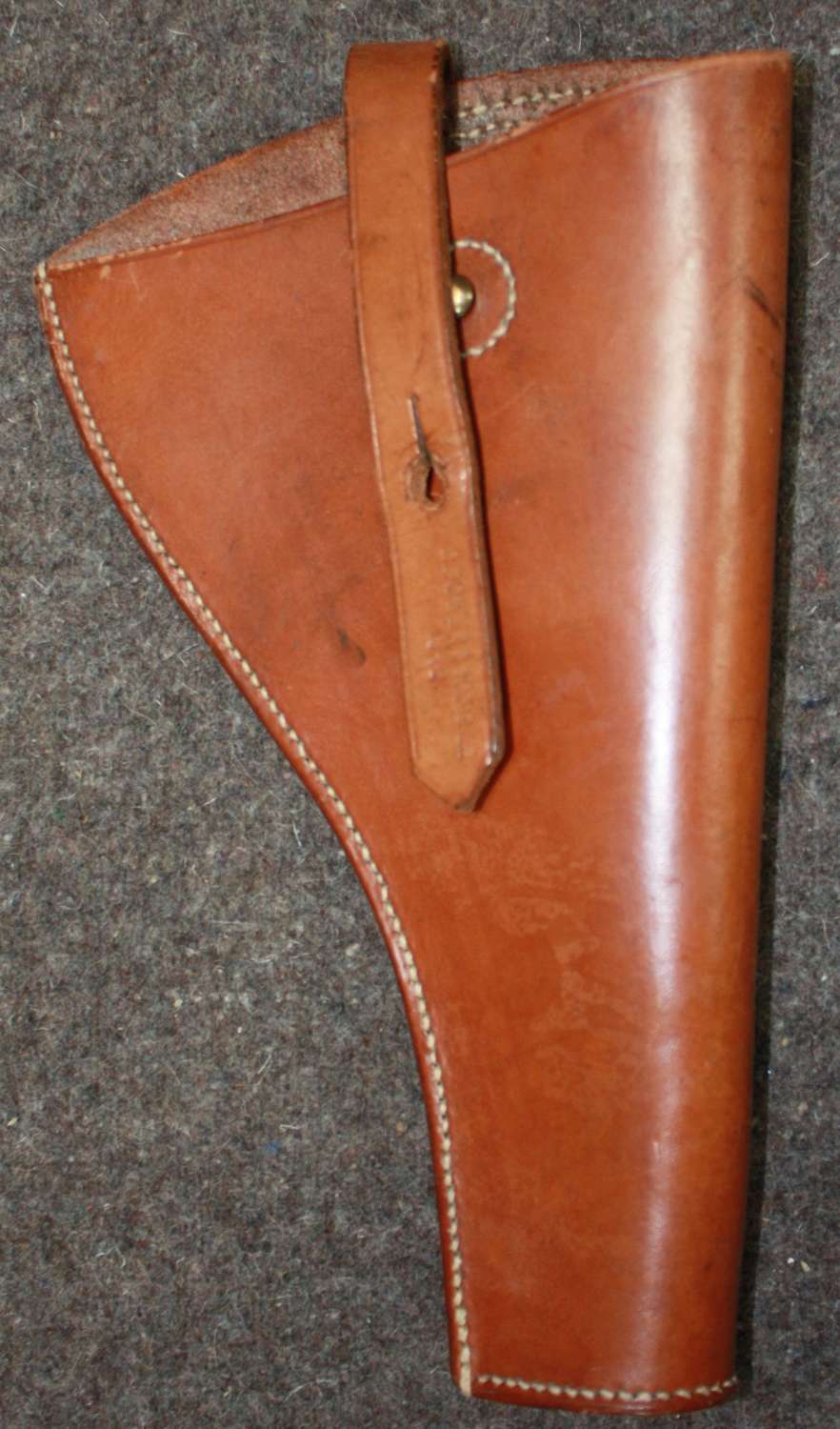 A GOOD OPEN TOP LEATHER 38 CAL PISTOL HOLSTER