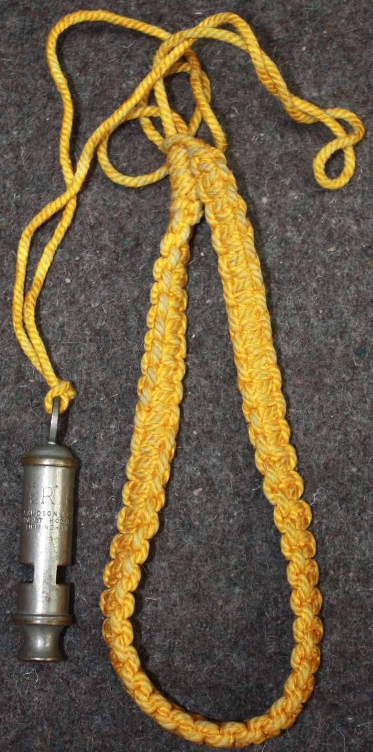 A WWII ARP LANYARD AND WHISTLE