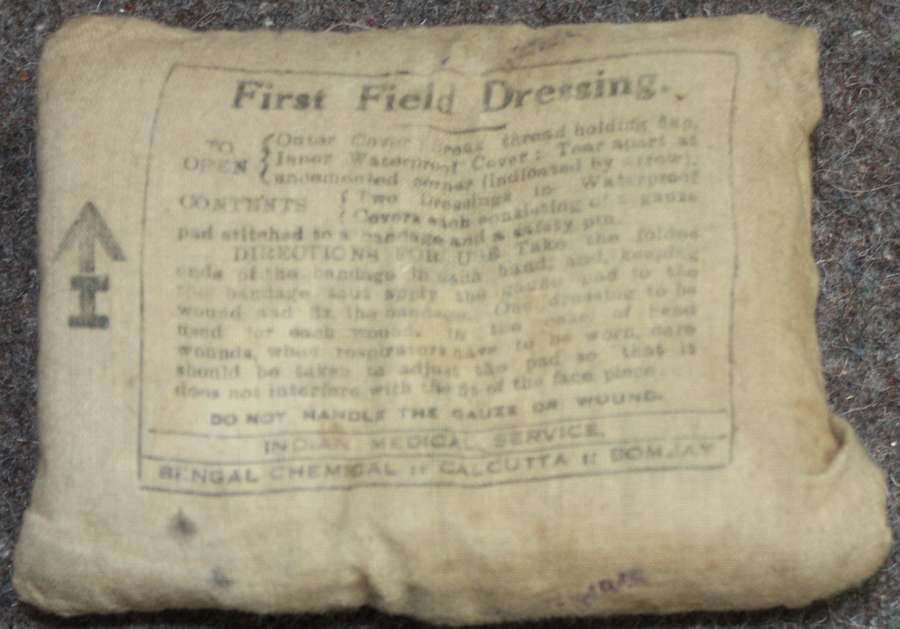 A WWII INDIAN ARMY ISSUE 1ST FIELD DRESSING