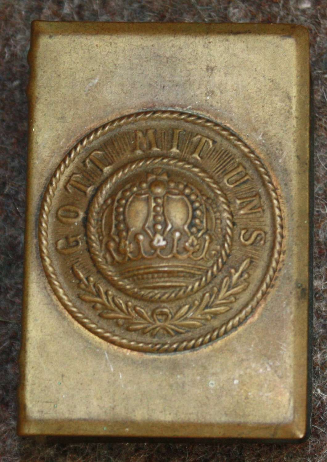 A WWI MATCH BOX COVER WITH A GERMAN PART OF BUCKLE