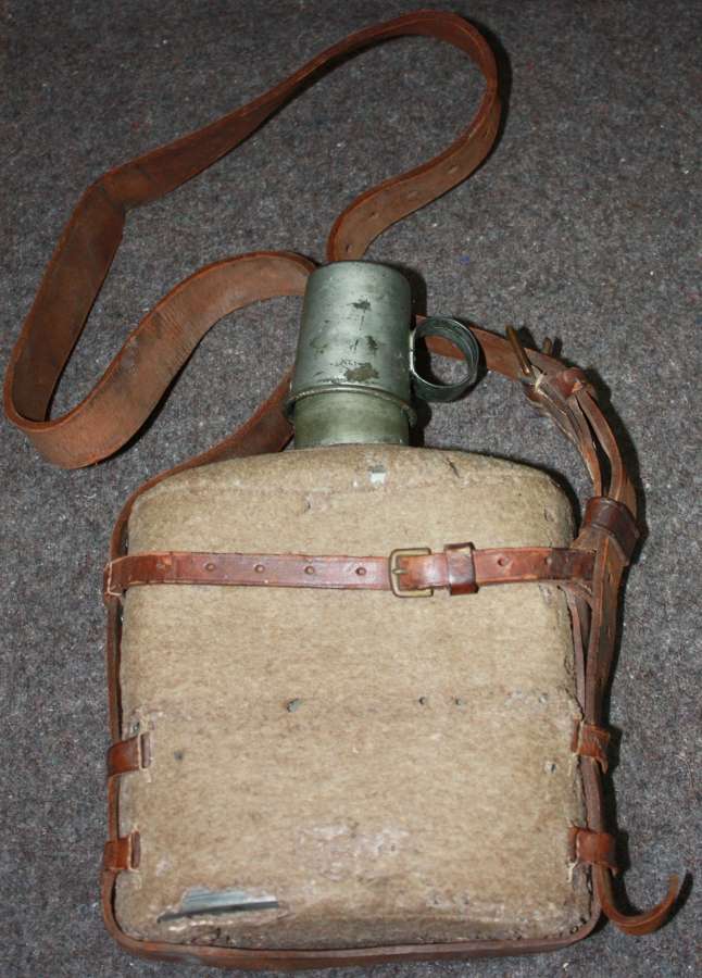 A WWII PERIOD MEDICS WATER BOTTLE AND AM CUP
