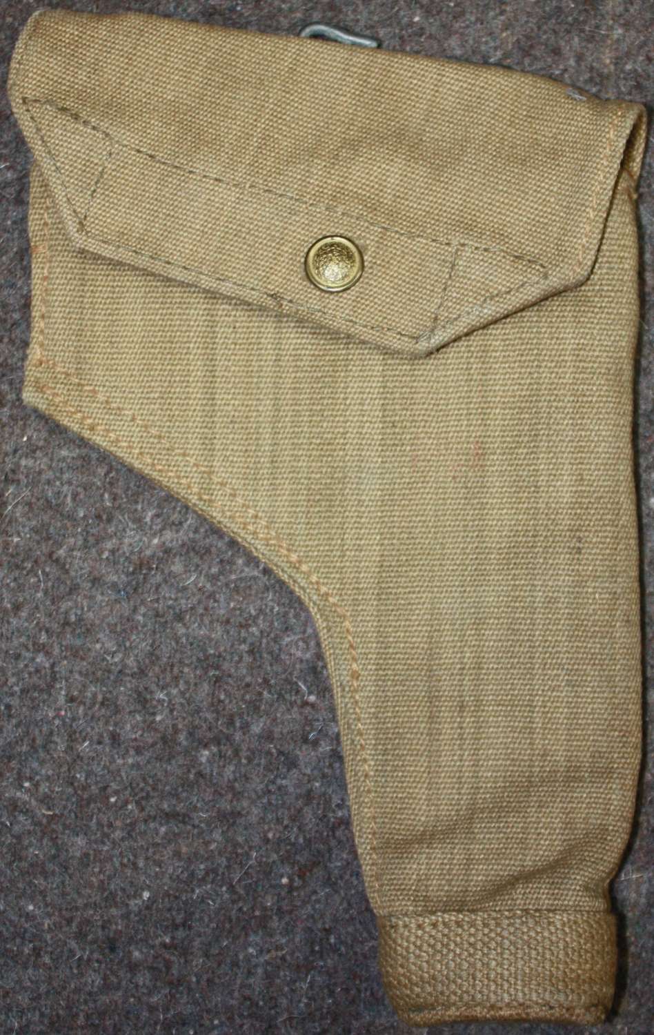A GOOD MINT WWII 1943 DATED 37 PATTERN WEBBING HOLSTER