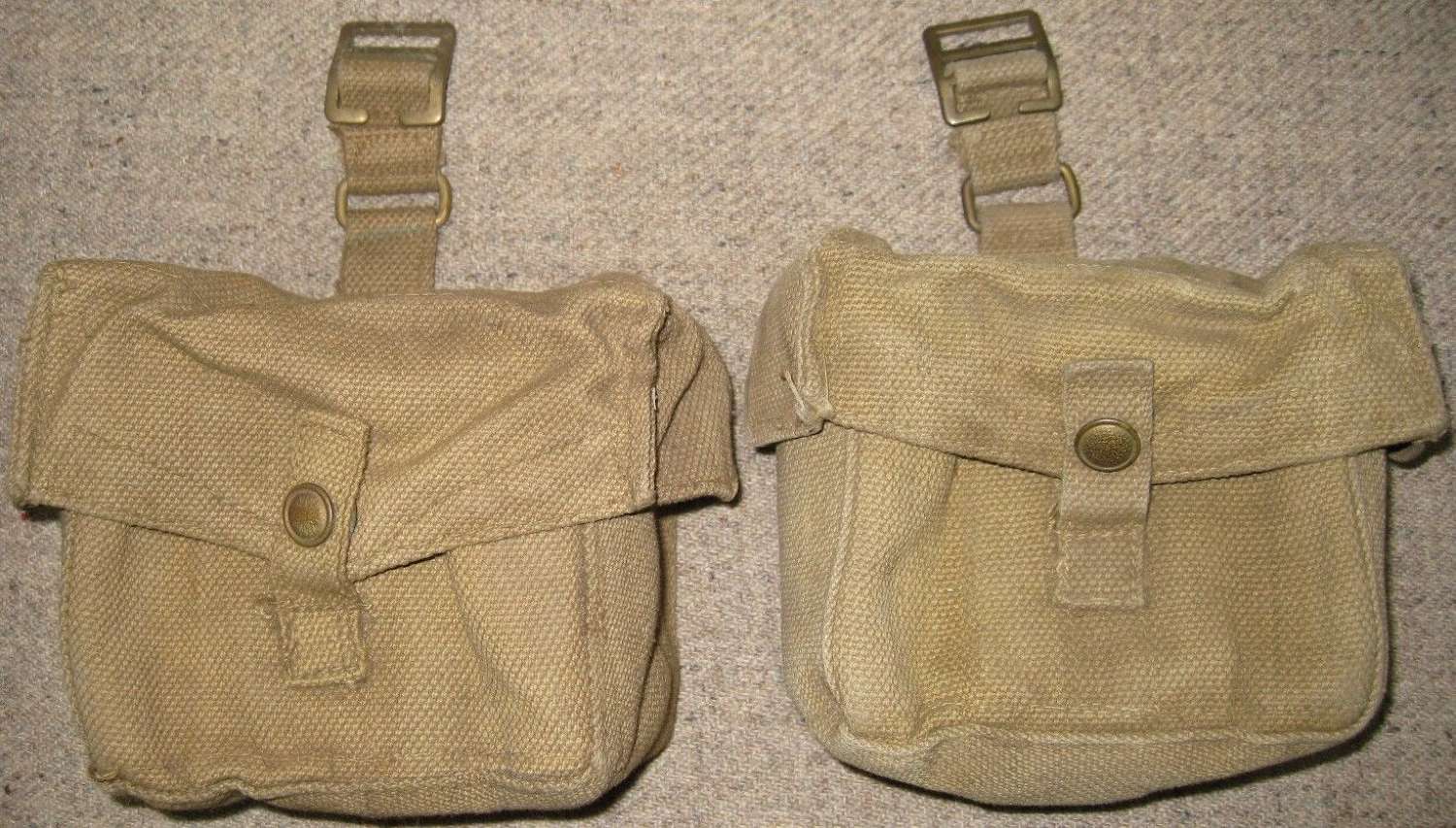 A PAIR OF HOME GUARD AMMO POUCHES PART OF THE HOME GAURD WEBBING SET