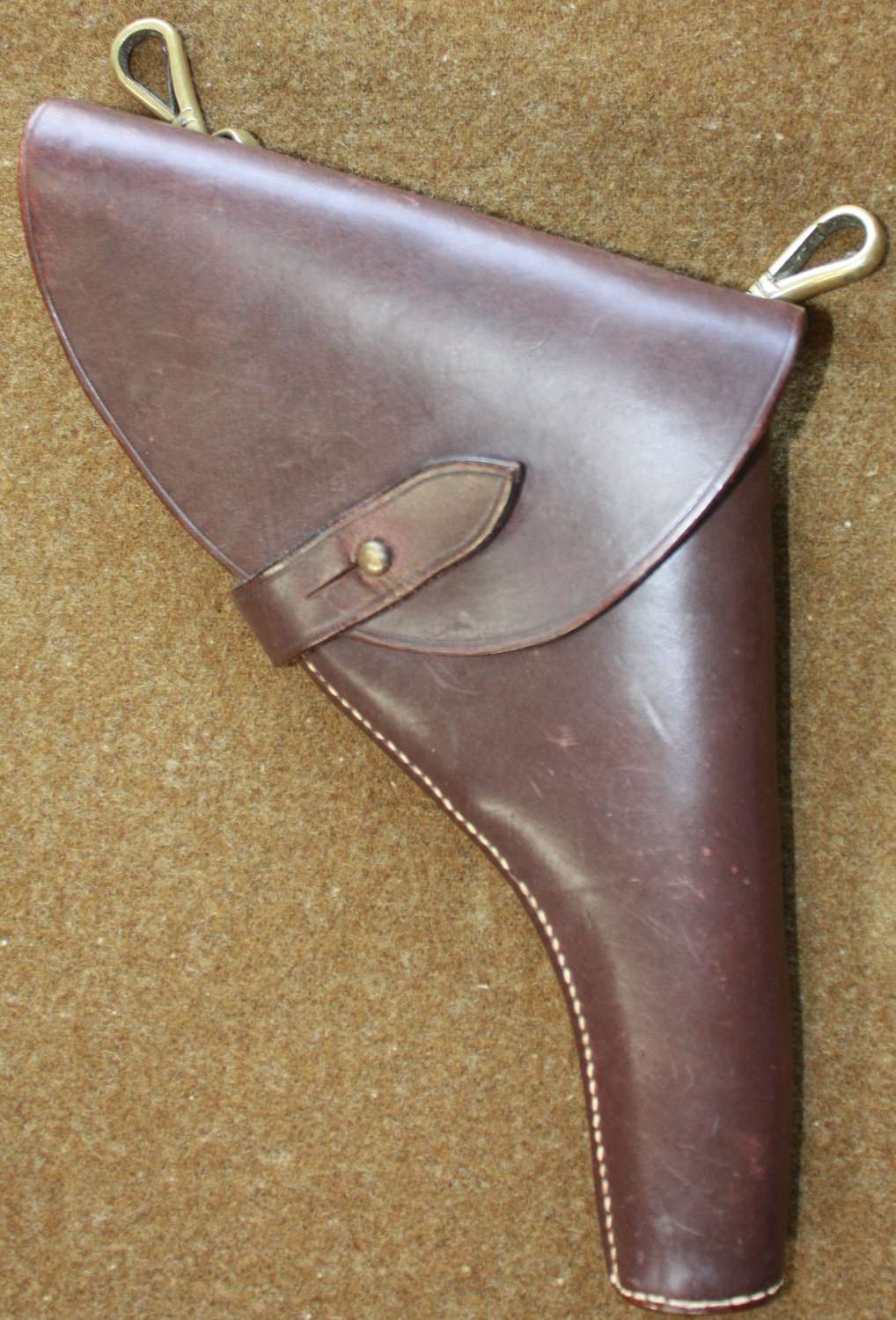 A SAM BROWN PISTOL HOLSTER FOR A SMALL 38 PISTOL