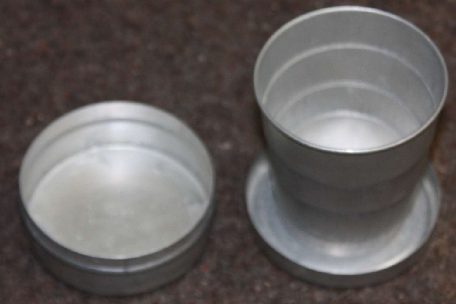 A PRIVATE PURCHASE ALLOY COLLAPSIBLE CUP