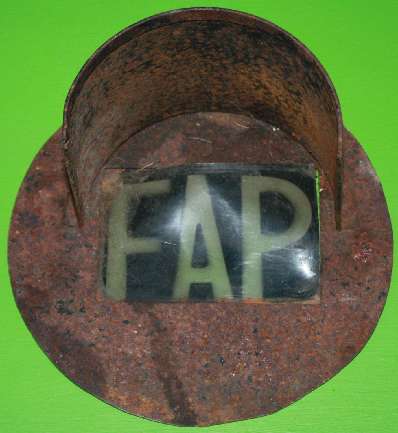 A RARE WWII FIST AID PARTY BLACK OUT HEAD LAMP COVER