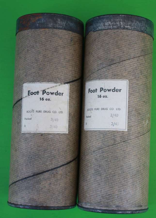A 1940 DATED LARGE FOOT POWDER ( FULL )
