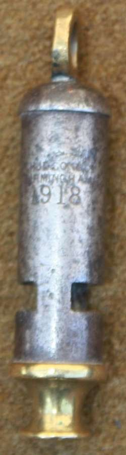 A 1918 DATED MILITARY ISSUE TUBE WHISTLE