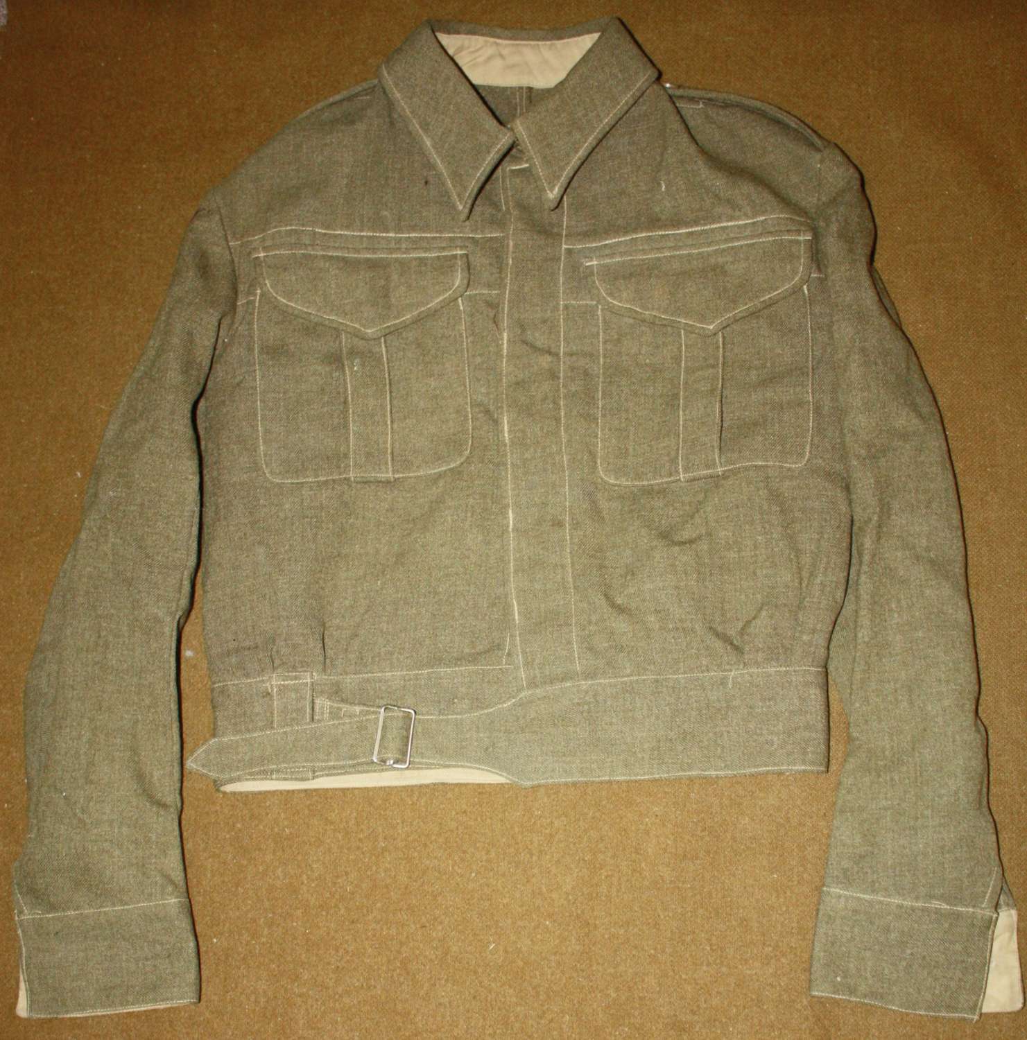 A FAIRLY GOOD WWII NEW ZEALAND BD JACKET SIZE 11