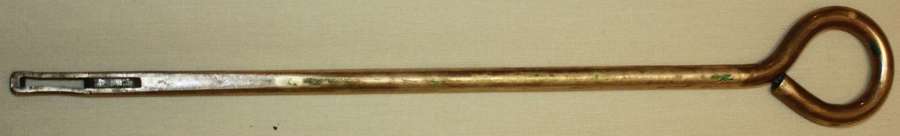 A WWI PERIOD PISTOL CLEANING ROD MADE BY L S WITH A ARROW MARK