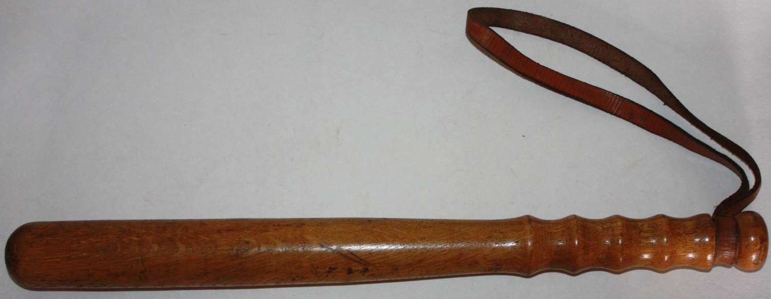 A RARE AND HARD TO FIND WWII MILITARY POLICE TRUNCHEON 1942 DATED