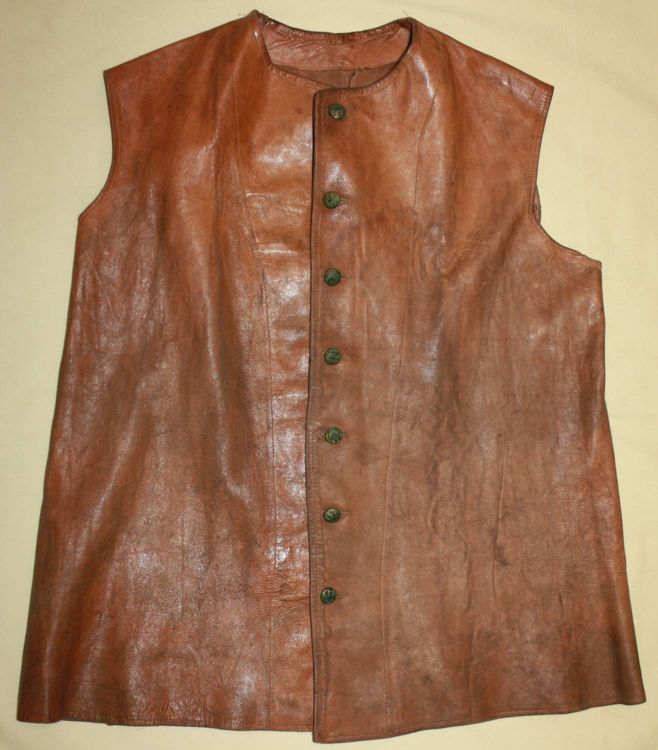 A GOOD EARLY WWII 1940 DATED INDIAN LEATHER JERKIN