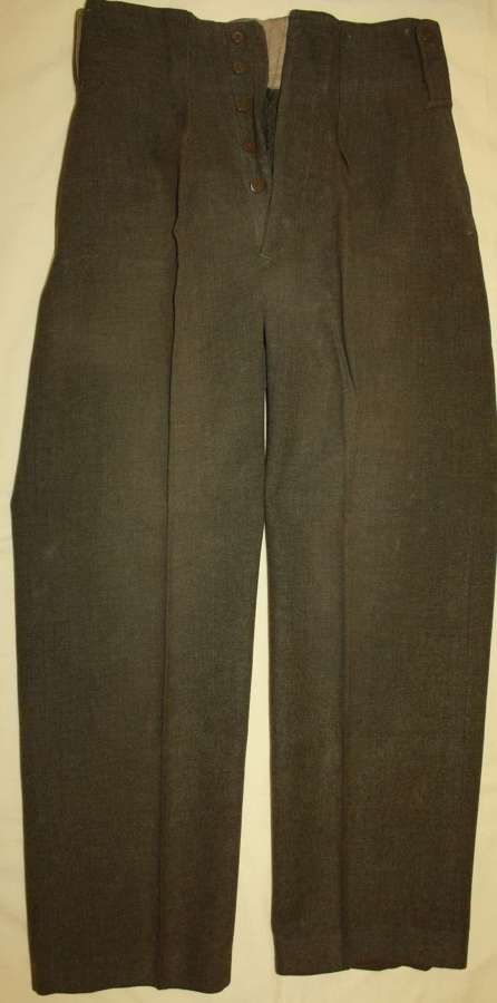 A PAIR OF 1944 DATED CANADIAN BATTLE DRESS TROUSERS