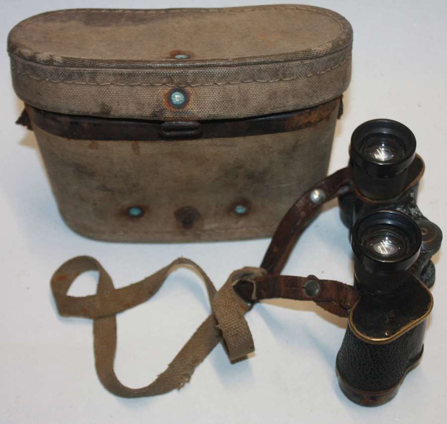 A PAIR OF WWII JAPANISE 6 X 30 BINOCULARS , STRAP AND CASE
