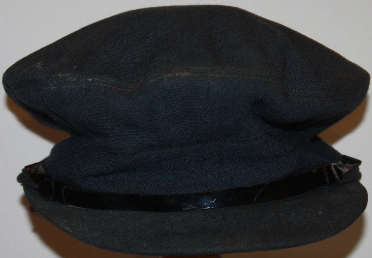 A GOOD USED WWII RAF OFFICERS PEAKED CAP