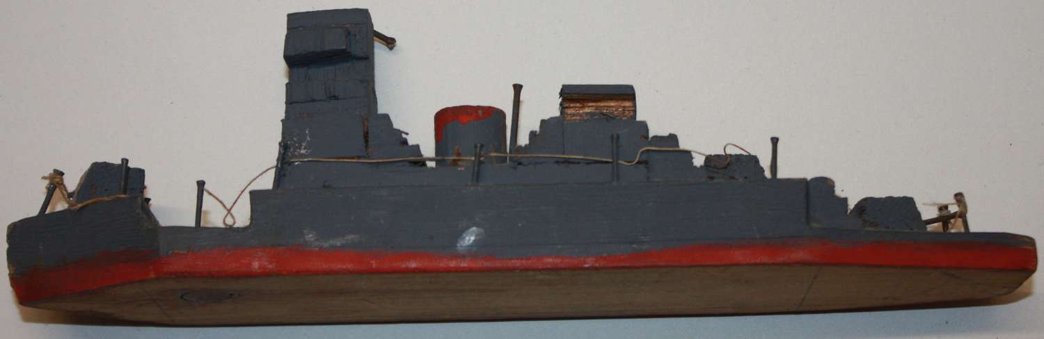 A CRUDE WWII KIDS BATTLE SHIP TOY