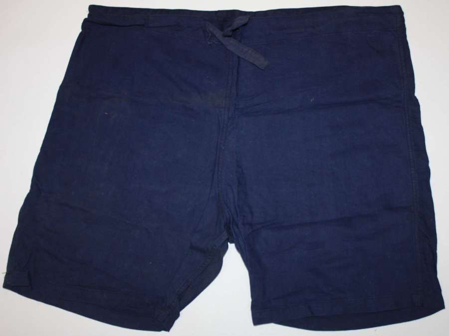 A PAIR OF BRITISH ARMY 1942 DATED PT  SHORTS SIZE 4
