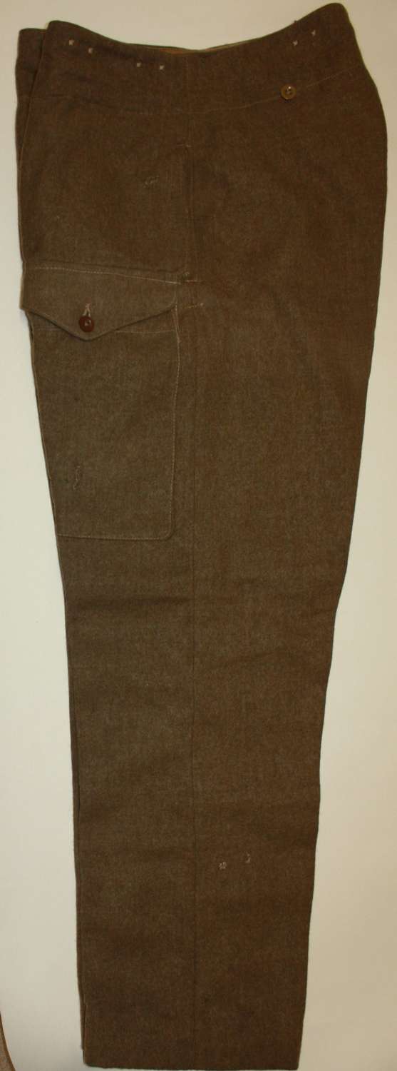 A GOOD USED PAIR OF THE BRITISH 1946 PATTERN BD TROUSERS SIZE 14