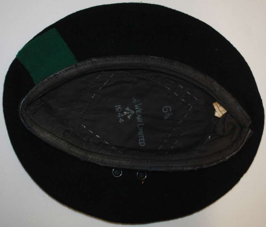 A GOOD USED 1945 DATED SIZE 6 3/4 BLACK BERET ISSUES