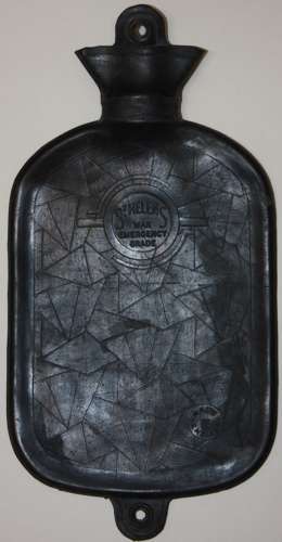 A RARE EXAMPLE OF THE BRITISH HOME FRONT HOTWATER BOTTLE