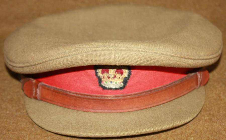 A GOOD POST WWII OFFICERS PEAKED CAP SIZE 7 1/2