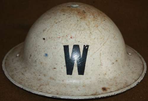 A GOOD 1938 DATED WHITE WARDENS HELMET  FRONT AND BACK W'S