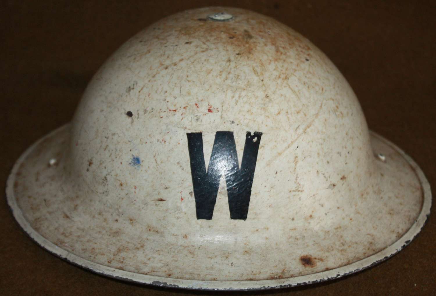 A GOOD 1938 DATED WHITE WARDENS HELMET  FRONT AND BACK W'S