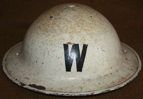 A GOOD 1938 DATED WHITE WARDENS HELMET  FRONT AND BACK W'S