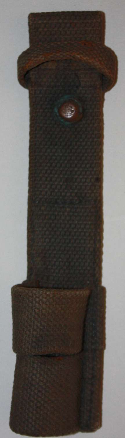 A good used example of the RAF 25 pattern webbing bayonet frog 1940
