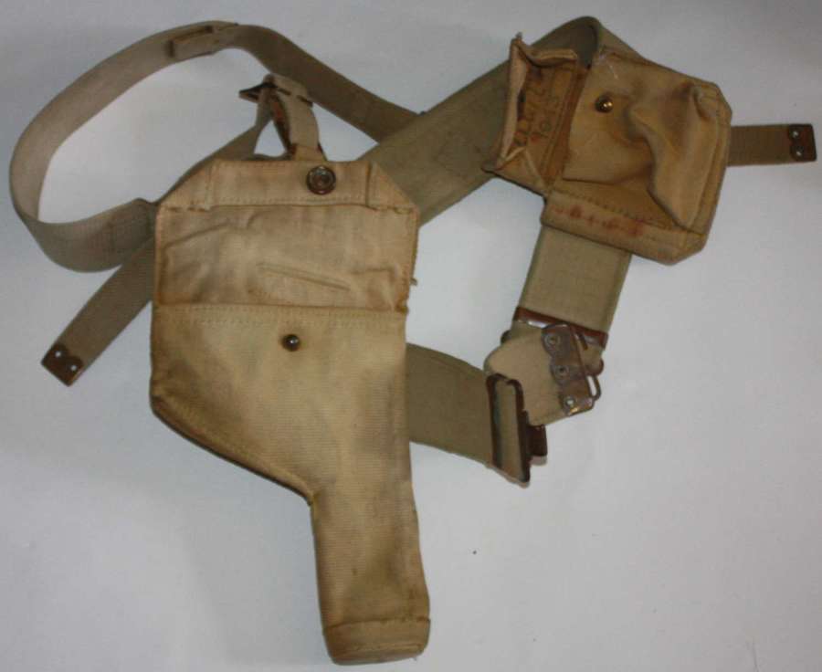 A WWII 37 pattern webbing pistol holster set up made up from bits