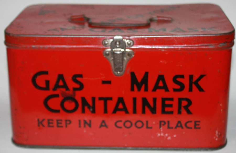 A GOOD WWII RED AND BLACK ARP GAS MASK TIN